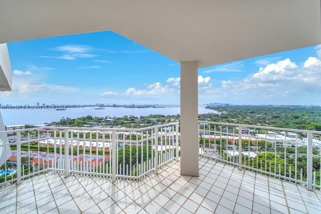 balcony featuring a water view