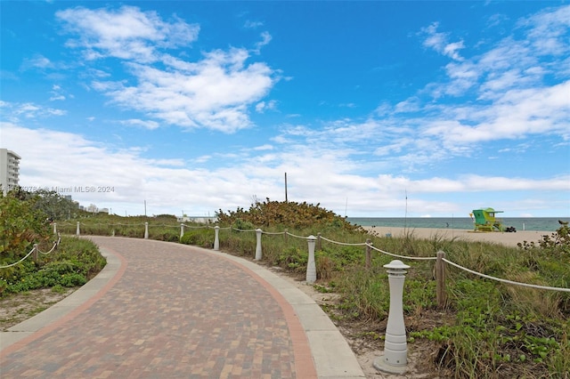 view of home's community featuring a water view