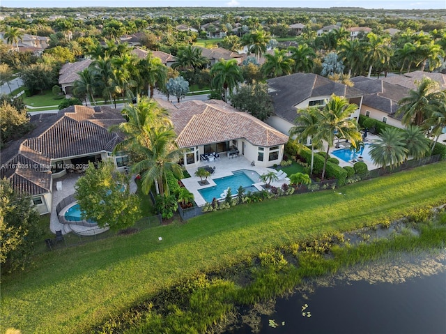 drone / aerial view with a water view