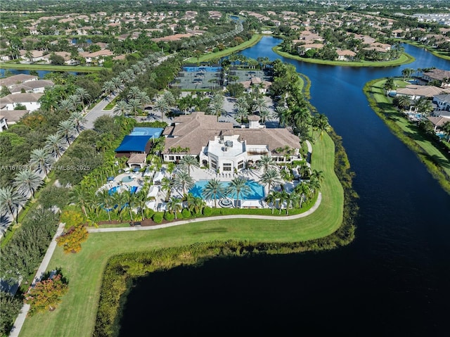 drone / aerial view with a water view