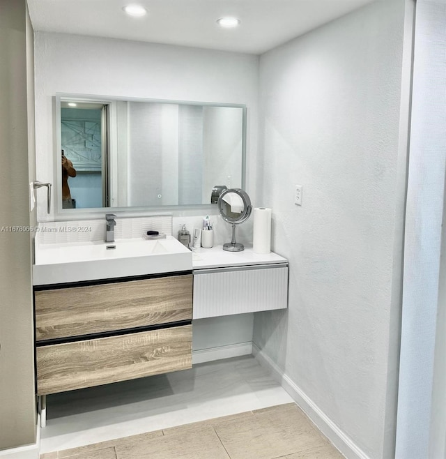 bathroom with vanity and tile patterned floors