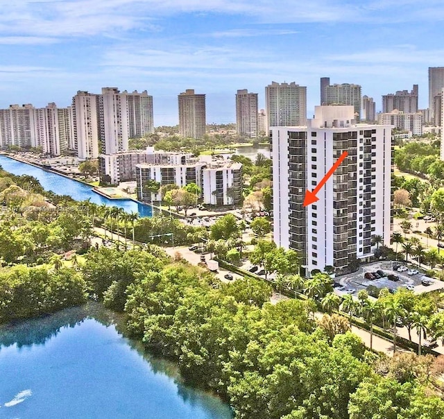 birds eye view of property featuring a water view