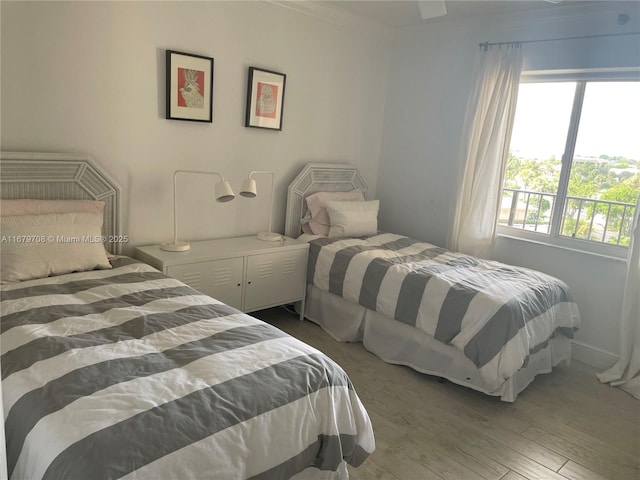 bedroom with wood-type flooring