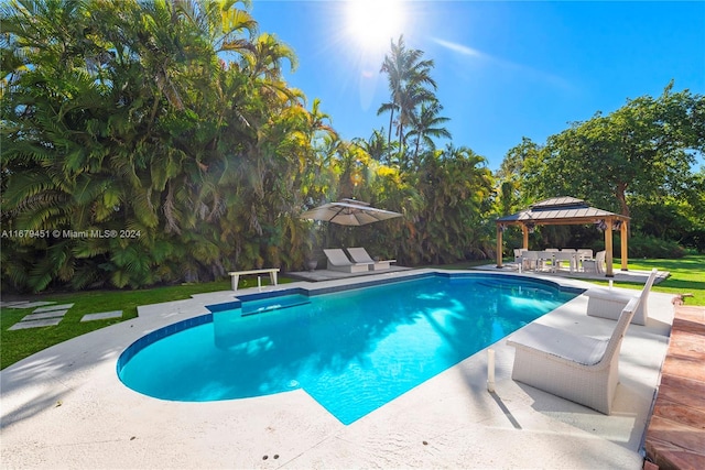 view of pool featuring a patio and a gazebo