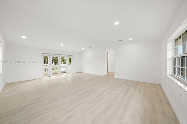 unfurnished room featuring light hardwood / wood-style floors