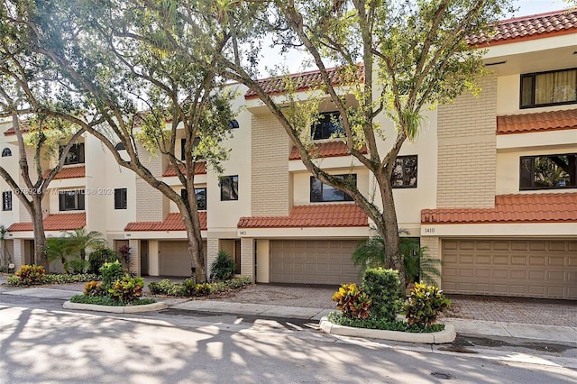 view of front of property with a garage