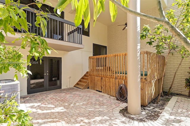 view of patio featuring french doors and central AC unit