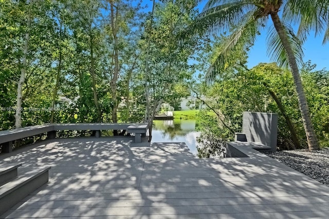 2340 NE 194th St, Miami, FL 33180 - wooden terrace with a dock and a water view