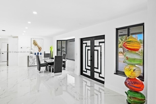 2340 NE 194th St, Miami, FL 33180 - dining space with marble tiled floors and recessed lighting