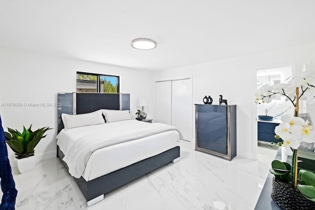 2340 NE 194th St, Miami, FL 33180 - bedroom with a closet and marble finish flooring