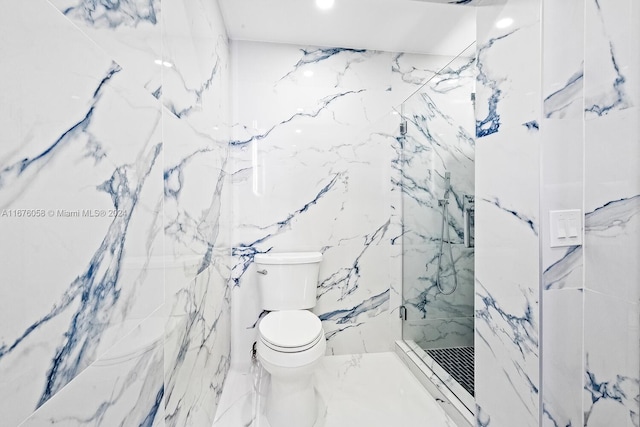 bathroom with an enclosed shower and toilet