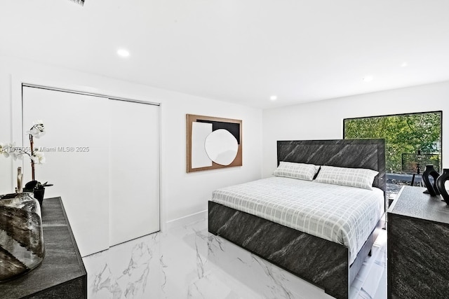 2340 NE 194th St, Miami, FL 33180 - bedroom with recessed lighting, marble tiled flooring, a closet, and baseboards
