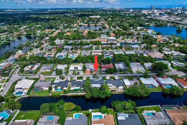 2340 NE 194th St, Miami, FL 33180 - aerial view of property's location featuring a nearby body of water and nearby suburban area