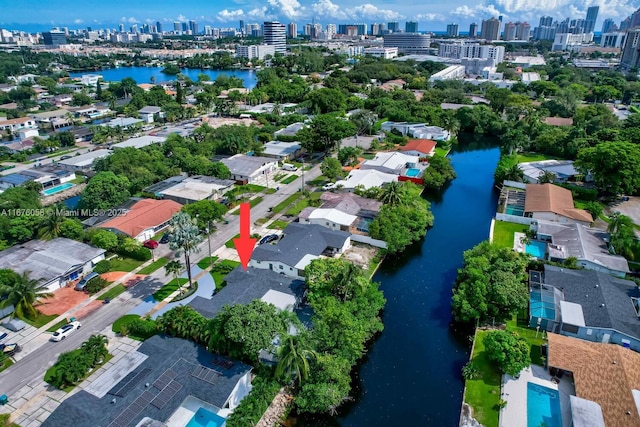 2340 NE 194th St, Miami, FL 33180 - aerial view of property and surrounding area featuring skyline, a nearby body of water, and nearby suburban area