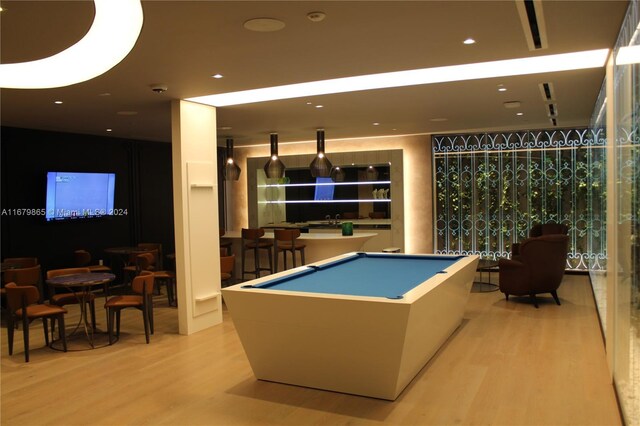 1000 Brickell Plz Unit 3112, Miami, FL 33131 - playroom featuring light wood-style floors, billiards, and a community bar