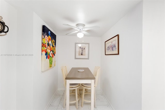 dining area with ceiling fan