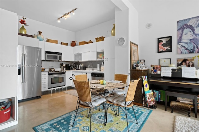 dining room with a high ceiling