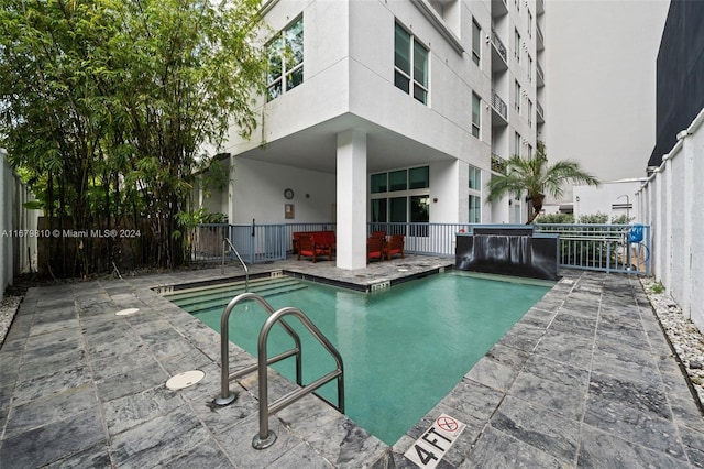 view of pool with a patio area