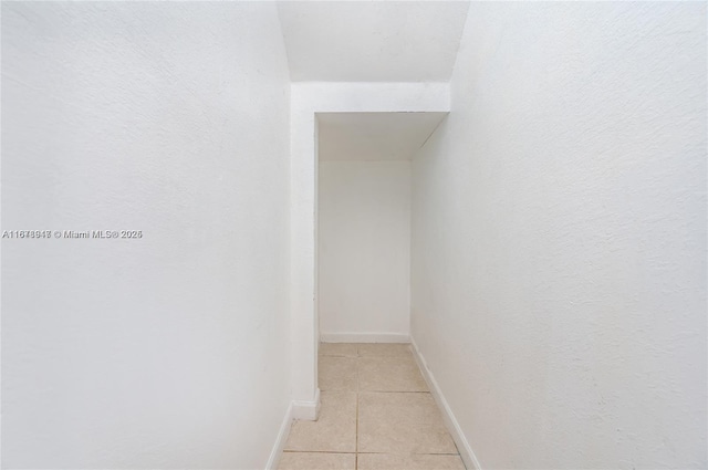 interior space featuring light tile patterned flooring