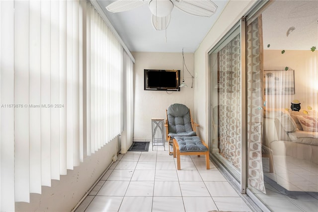 hallway with light tile patterned floors