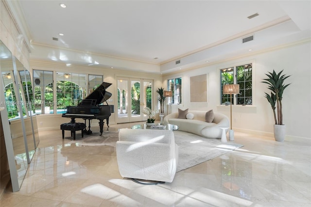 living room with french doors and crown molding