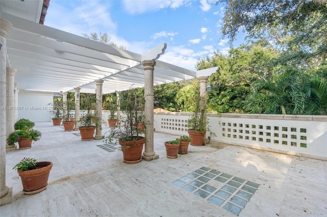 view of patio featuring a pergola