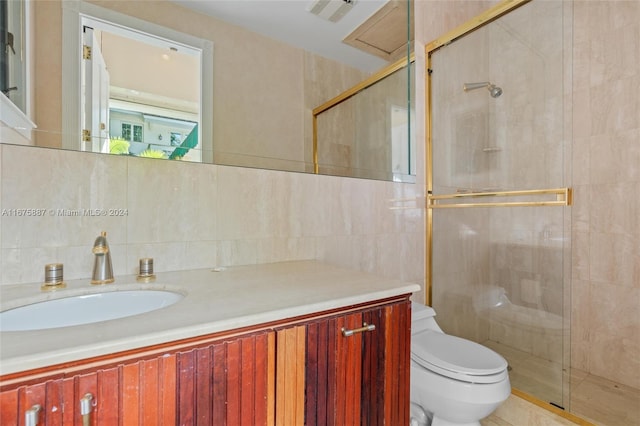 bathroom featuring walk in shower, tasteful backsplash, and vanity