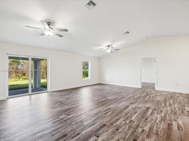 unfurnished room featuring vaulted ceiling, wood-type flooring, and ceiling fan