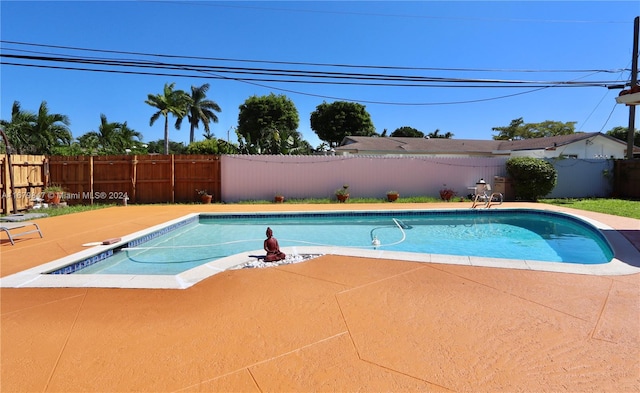 view of pool with a patio area