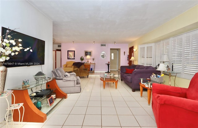 living room featuring light tile patterned flooring