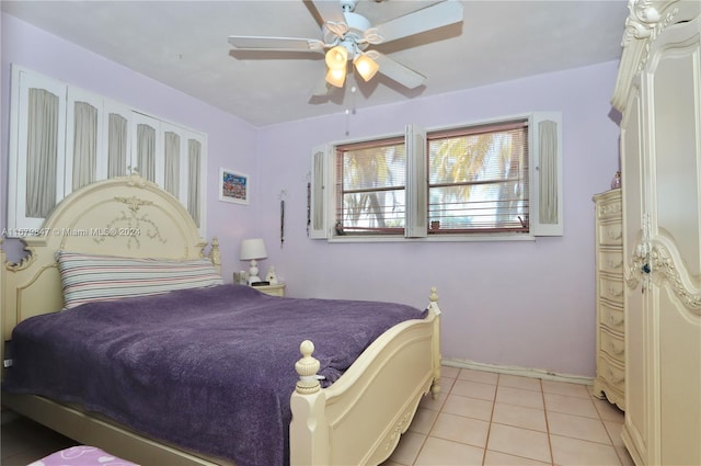 bedroom featuring ceiling fan and light tile patterned flooring