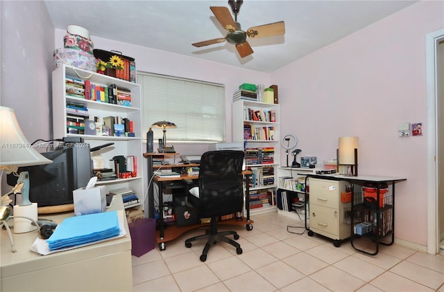 tiled office space with ceiling fan