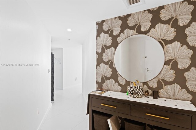 corridor featuring light tile patterned flooring