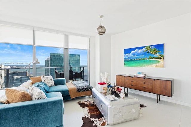 tiled living room with a water view