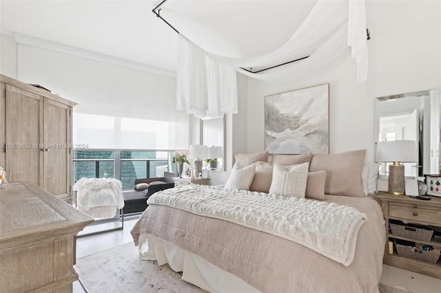 bedroom featuring light wood-type flooring