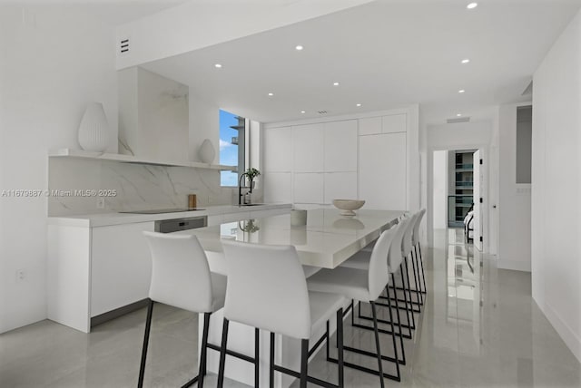 dining space with recessed lighting