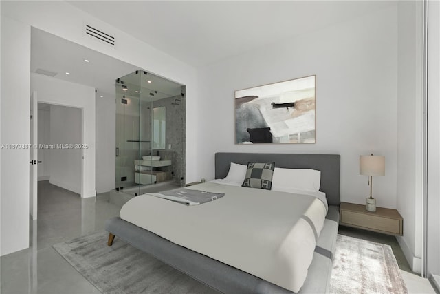 bedroom with recessed lighting, visible vents, and concrete floors