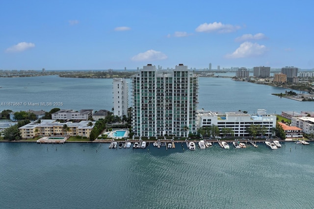 aerial view featuring a water view and a city view