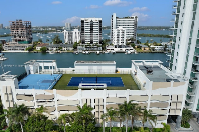 drone / aerial view featuring a water view and a city view