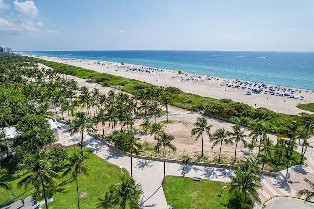 aerial view featuring a water view and a beach view