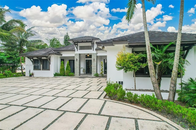 rear view of house with a patio area