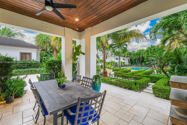 view of patio featuring ceiling fan