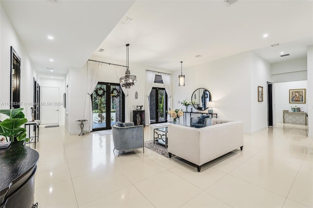 tiled living room with french doors