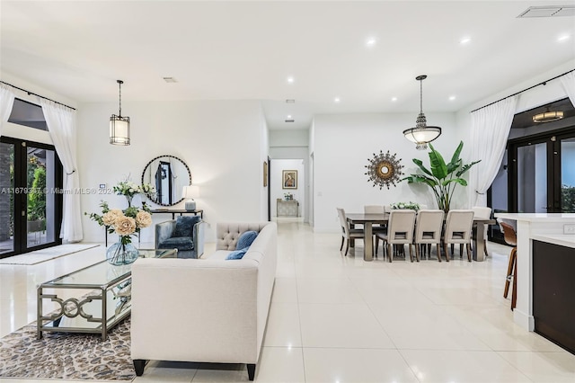 tiled living room with french doors