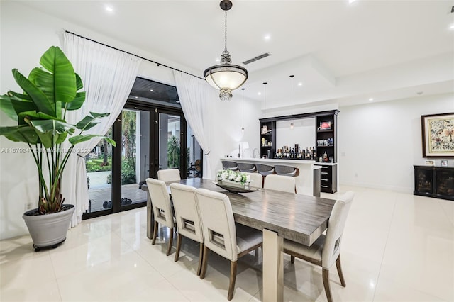 tiled dining area with french doors