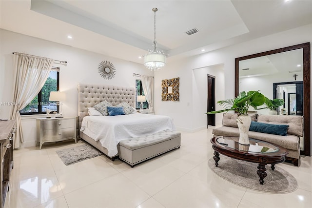 tiled bedroom with a notable chandelier and a tray ceiling