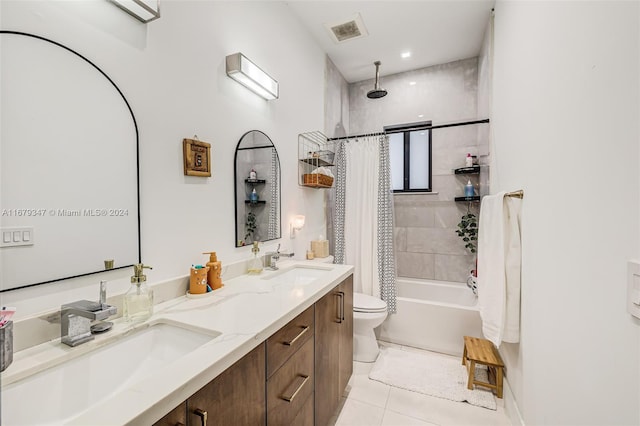 full bathroom with toilet, shower / bath combo with shower curtain, vanity, and tile patterned flooring