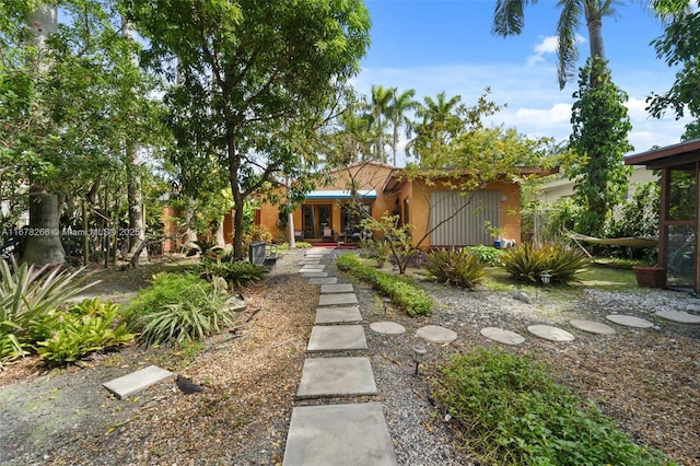 view of yard with french doors