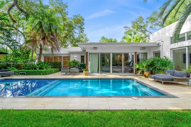 view of pool featuring a patio