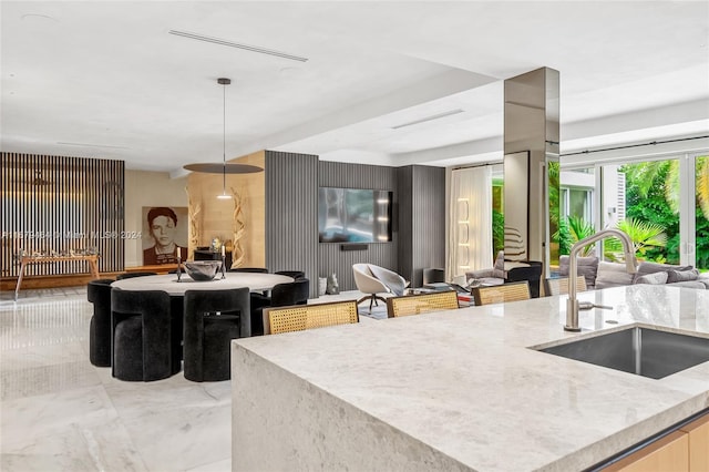 kitchen featuring sink and pendant lighting